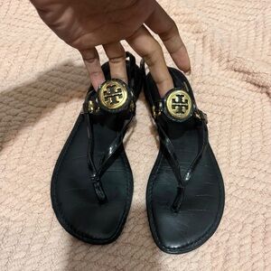 Tory Burch Black Patent Thong Sandals with Gold Logo Medallions